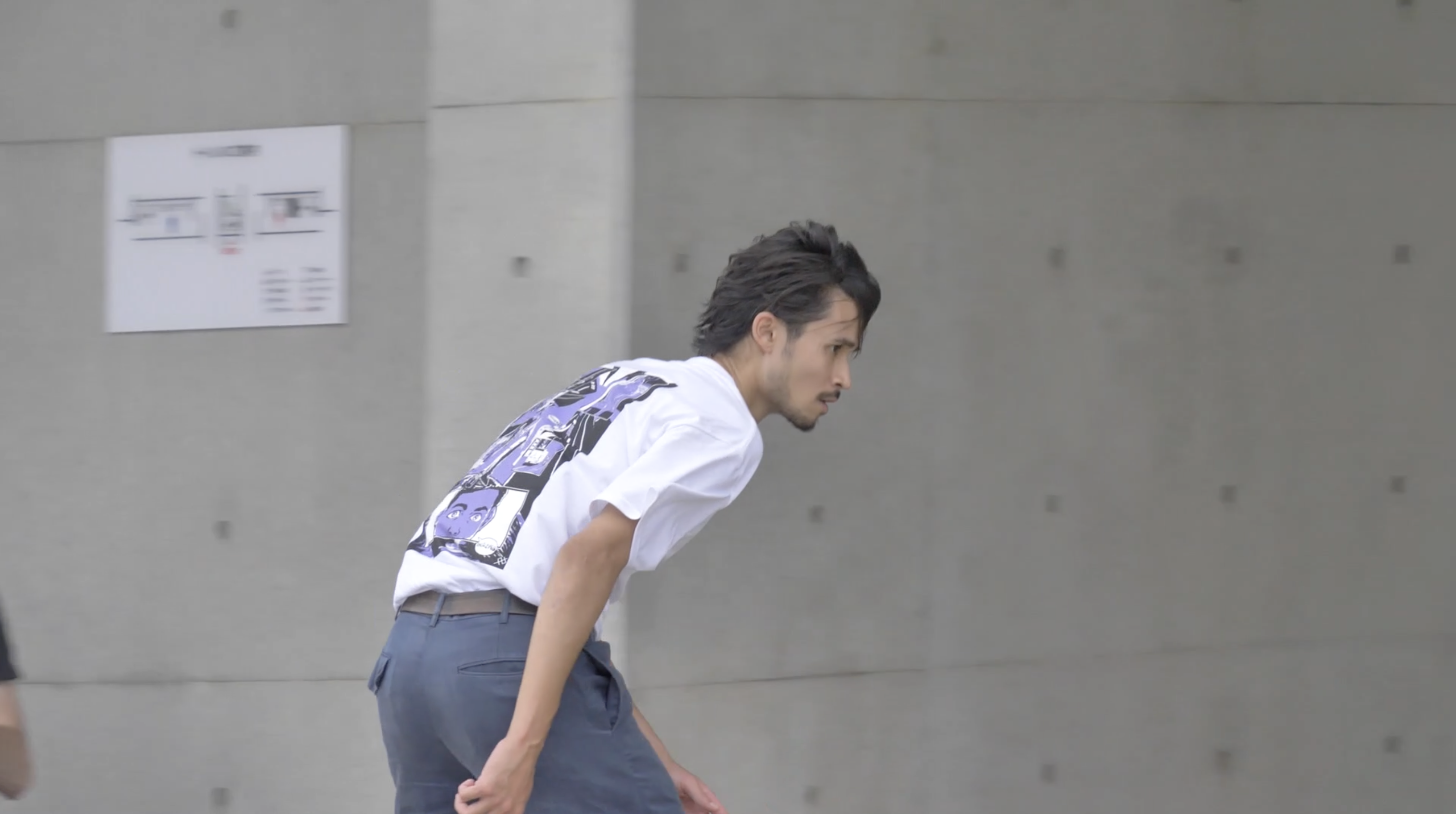 Skater wearing WAFFLESNCREAM shirt