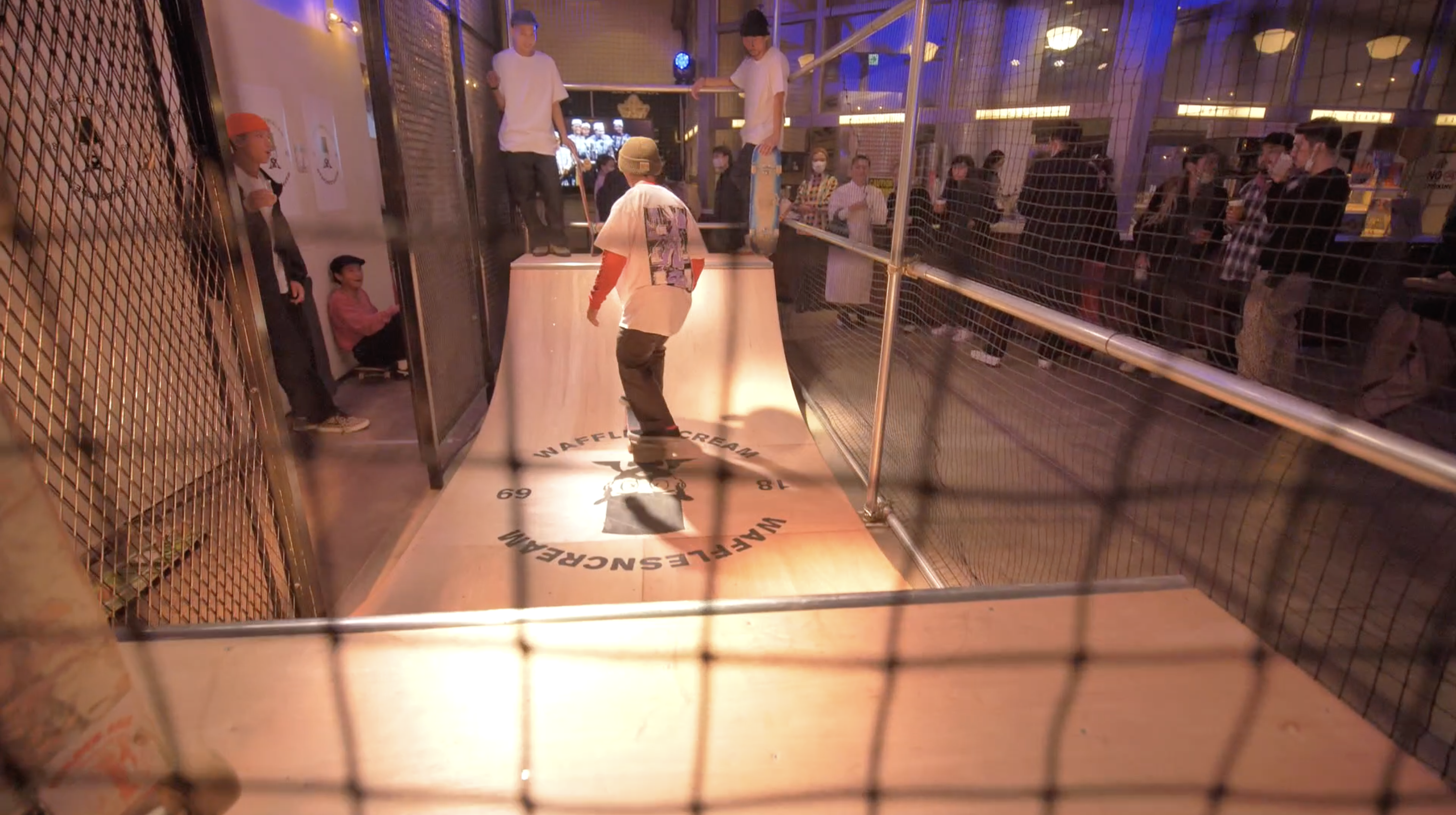 Skater in the middle of a skate ramp